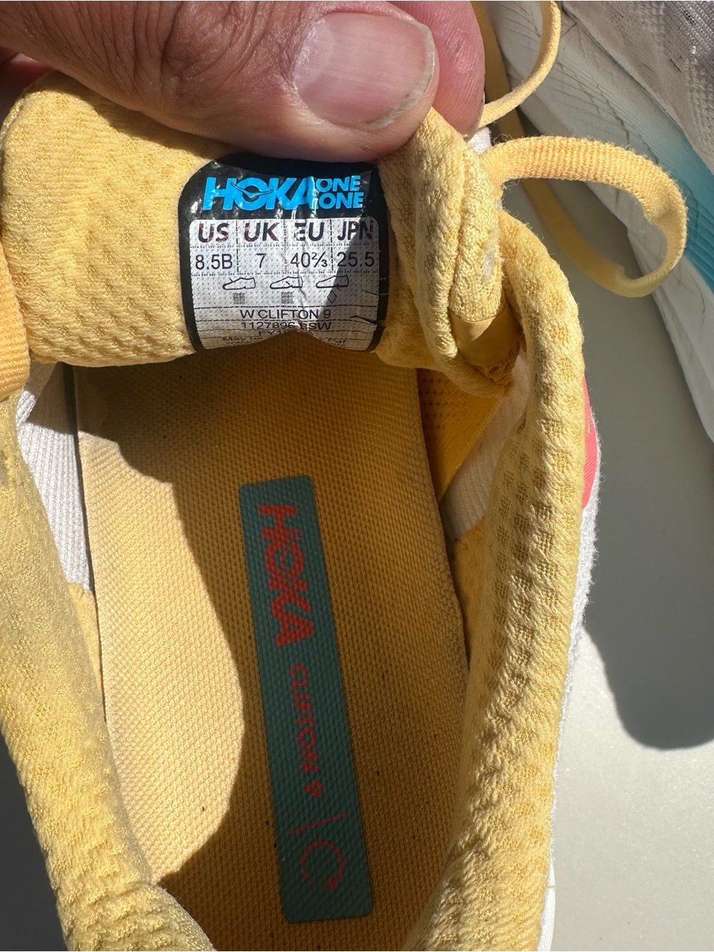 Hoka White Running Shoes with Yellow, Blue & Pink Accents - Picture 6 of 6